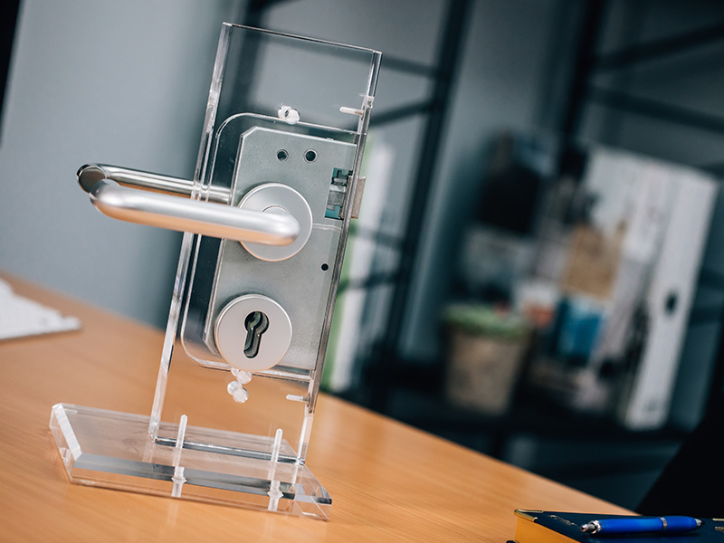 Perspex display of door hardware