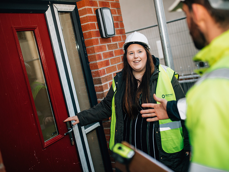 Construction workers communicating on site